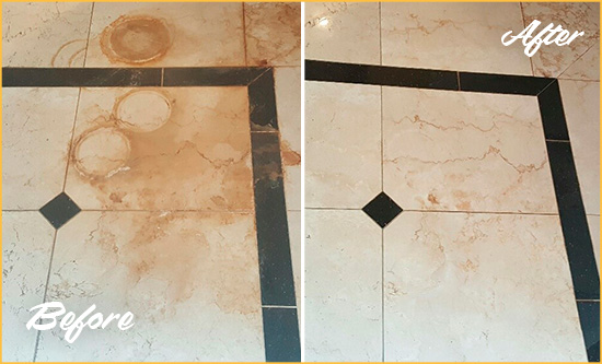 Before and After Picture of a Holopaw Marble Floor Cleaned to Eliminate Rust Stains