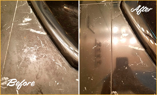 Before and After Picture of a St. Cloud Marble Tub Stone Sealed to Remove Stains