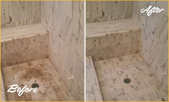 Before and After Picture of a St. Cloud Marble Shower Honed to Remove Dark Stains